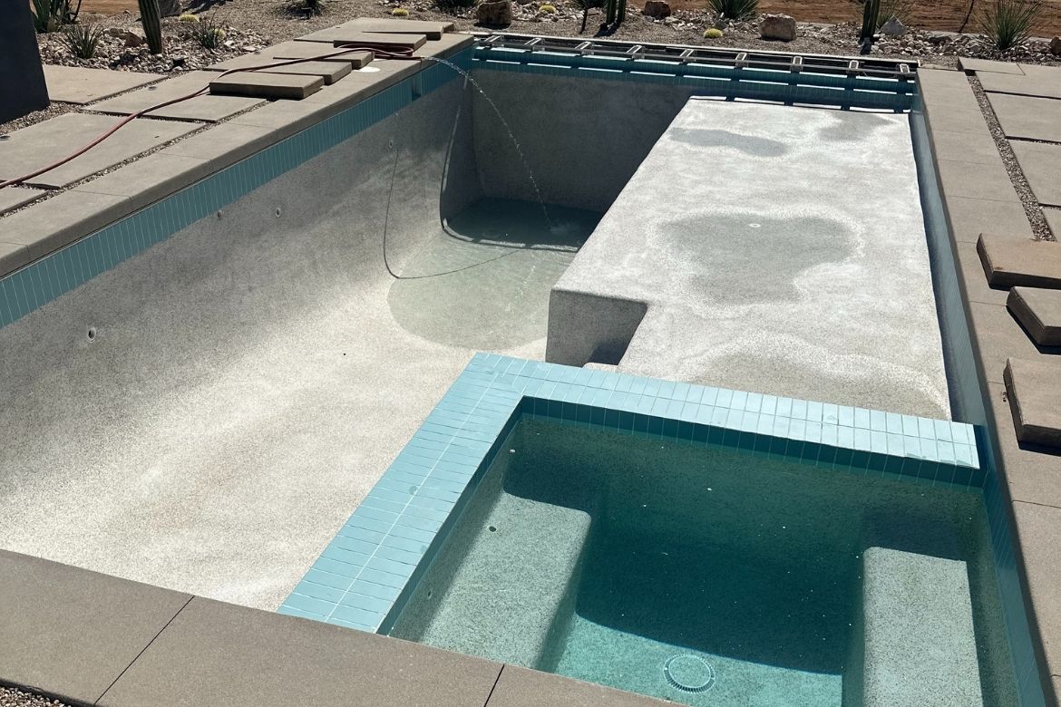 Concrete pool and integrated spa detail at a Joshua Tree custom-built home